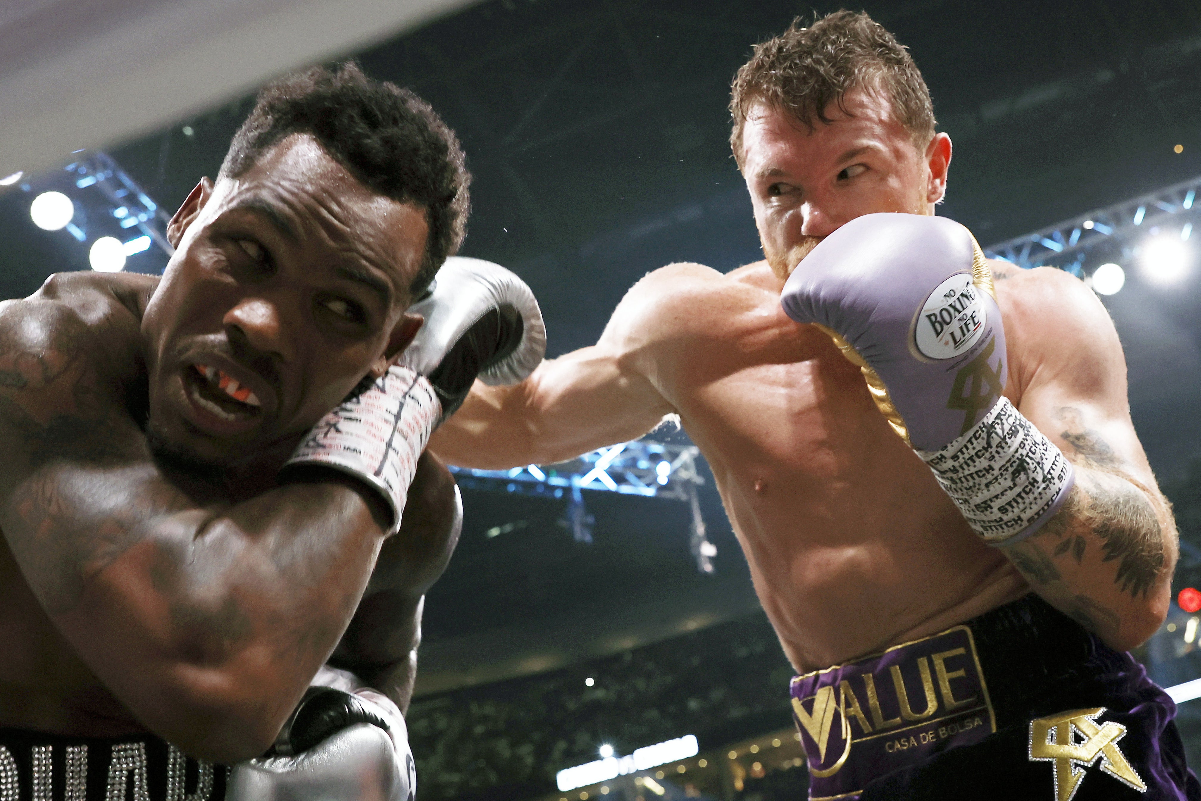 Saul ‘Canelo’ Alvarez (right) en route to victory over Jermell Charlo