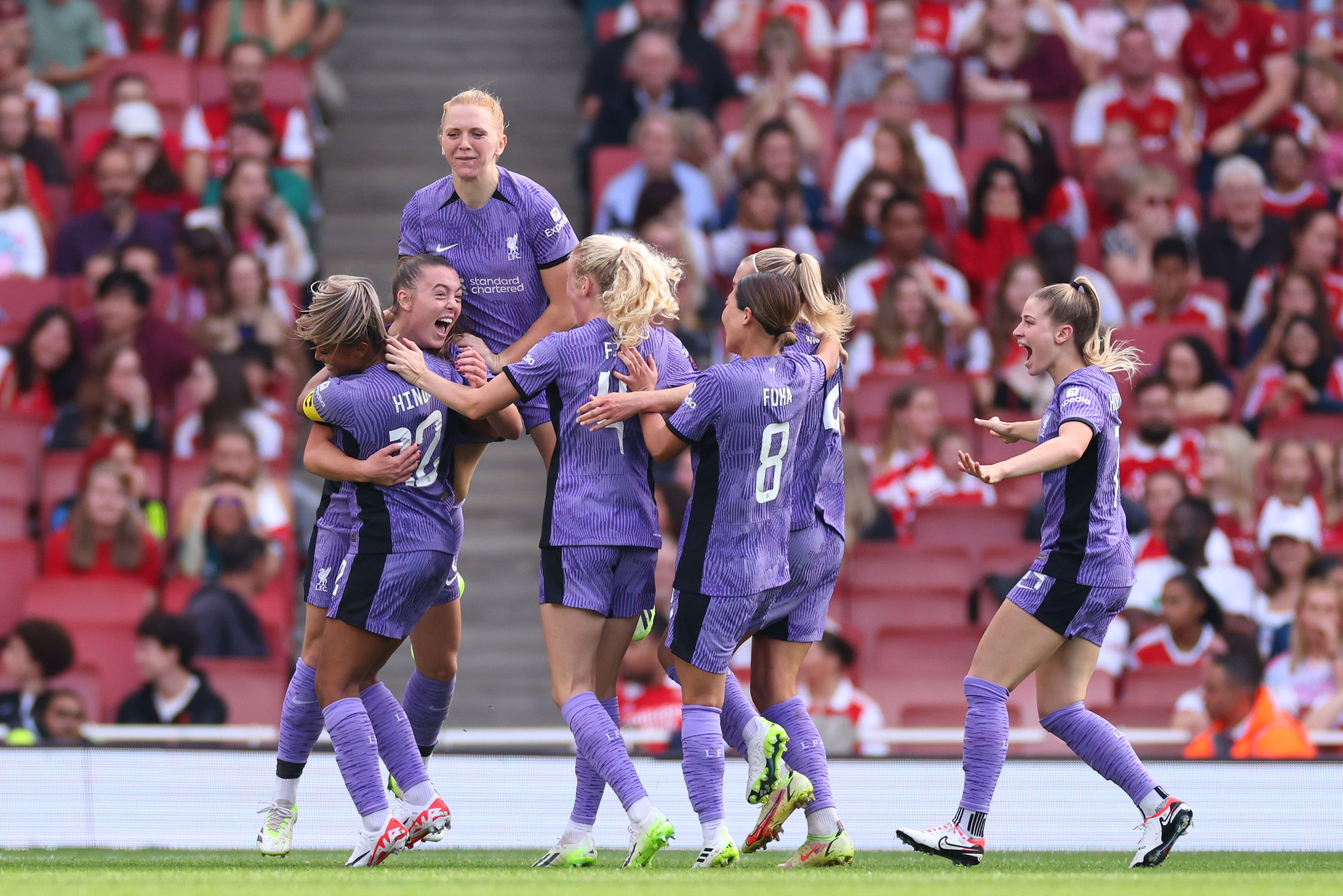 <p>Miri Taylor celebrates scoring Liverpool’s winner at the Emirates </p>