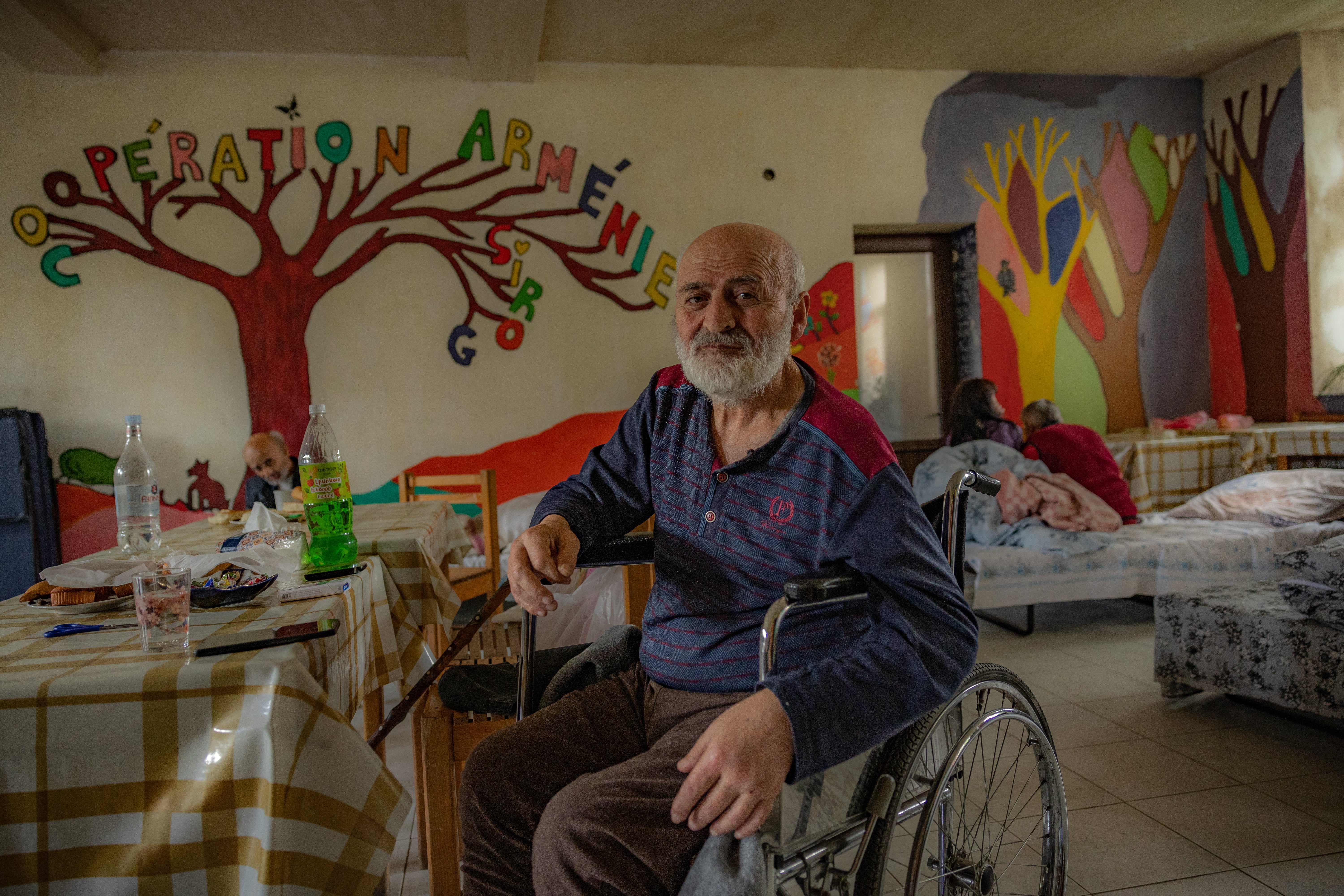 Elderly and disabled Armenian refugees are hosted in hotels, schools and private homes