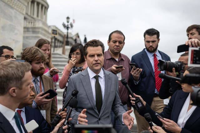 <p>Matt Gaetz speaks to reporters outside of the US Capitol amid a vote to avert a government shutdown</p>