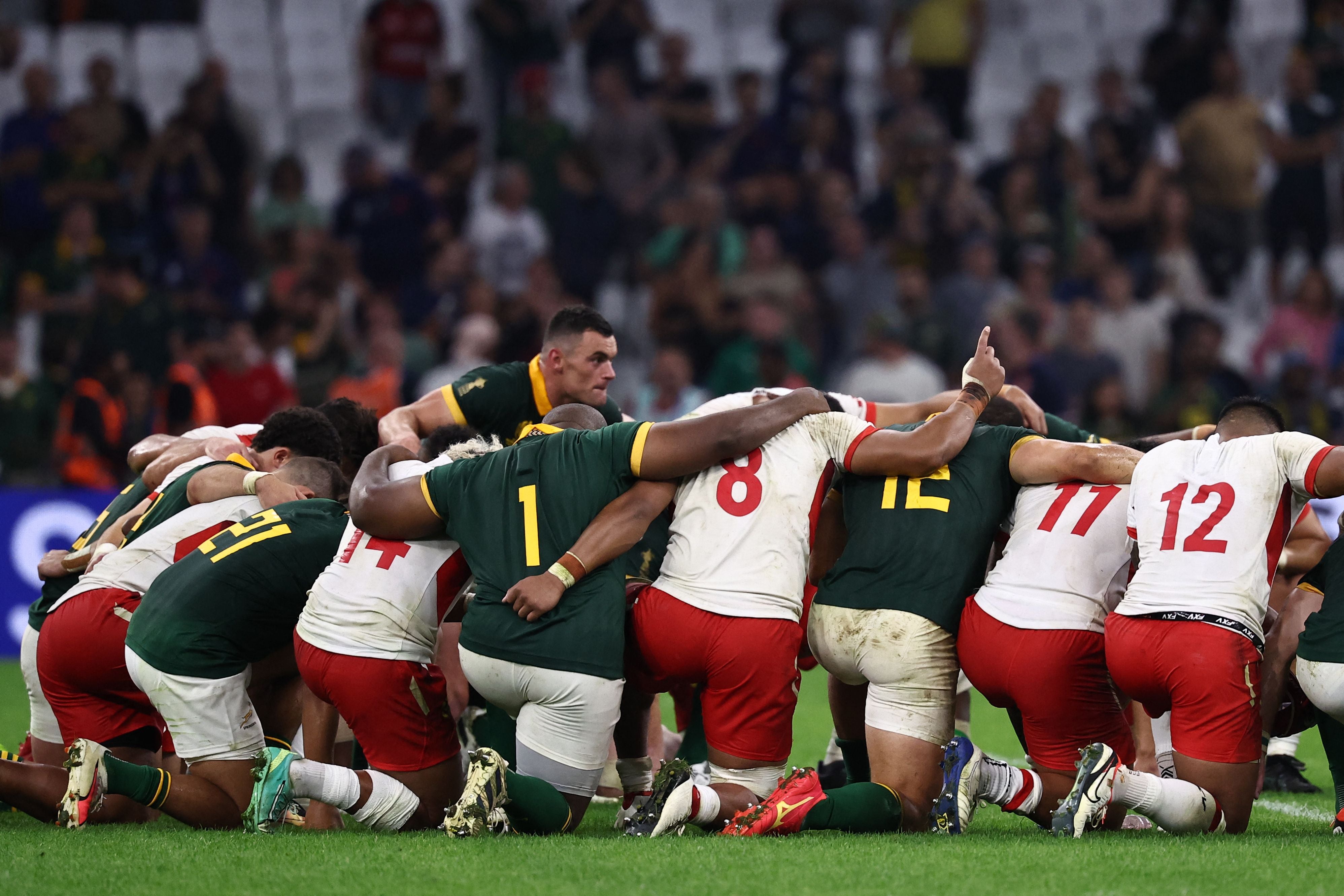 Tonga and South Africa players took the knee together after the final whistle