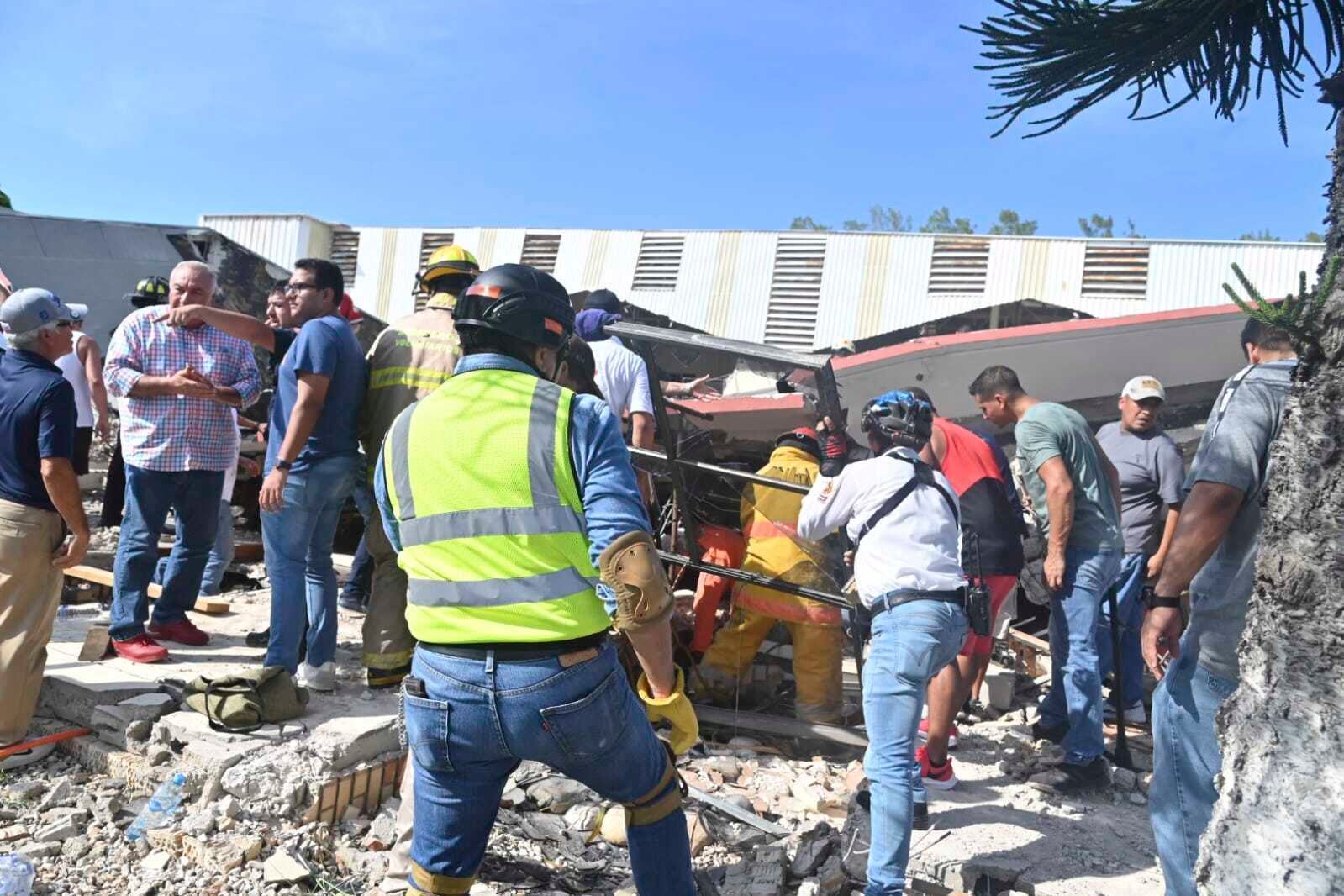 Rescue workers search for survivors amid debris after the roof of a church collapsed during a Sunday Mass in Ciudad Madero, Mexico