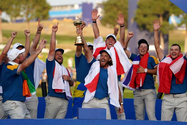 Team Europe’s Tommy Fleetwood lifts the Ryder Cup trophy (David Davies/PA)