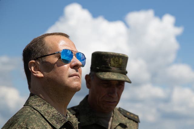 <p>Russia’s former president and now serving as deputy chairman of the country’s Security Council, Dmitry Medvedev (L), visits the Totsky military training field outside Siberian city of Orenburg</p>