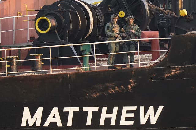Military personnel onboard the MV Matthew (Niall Carson/PA)