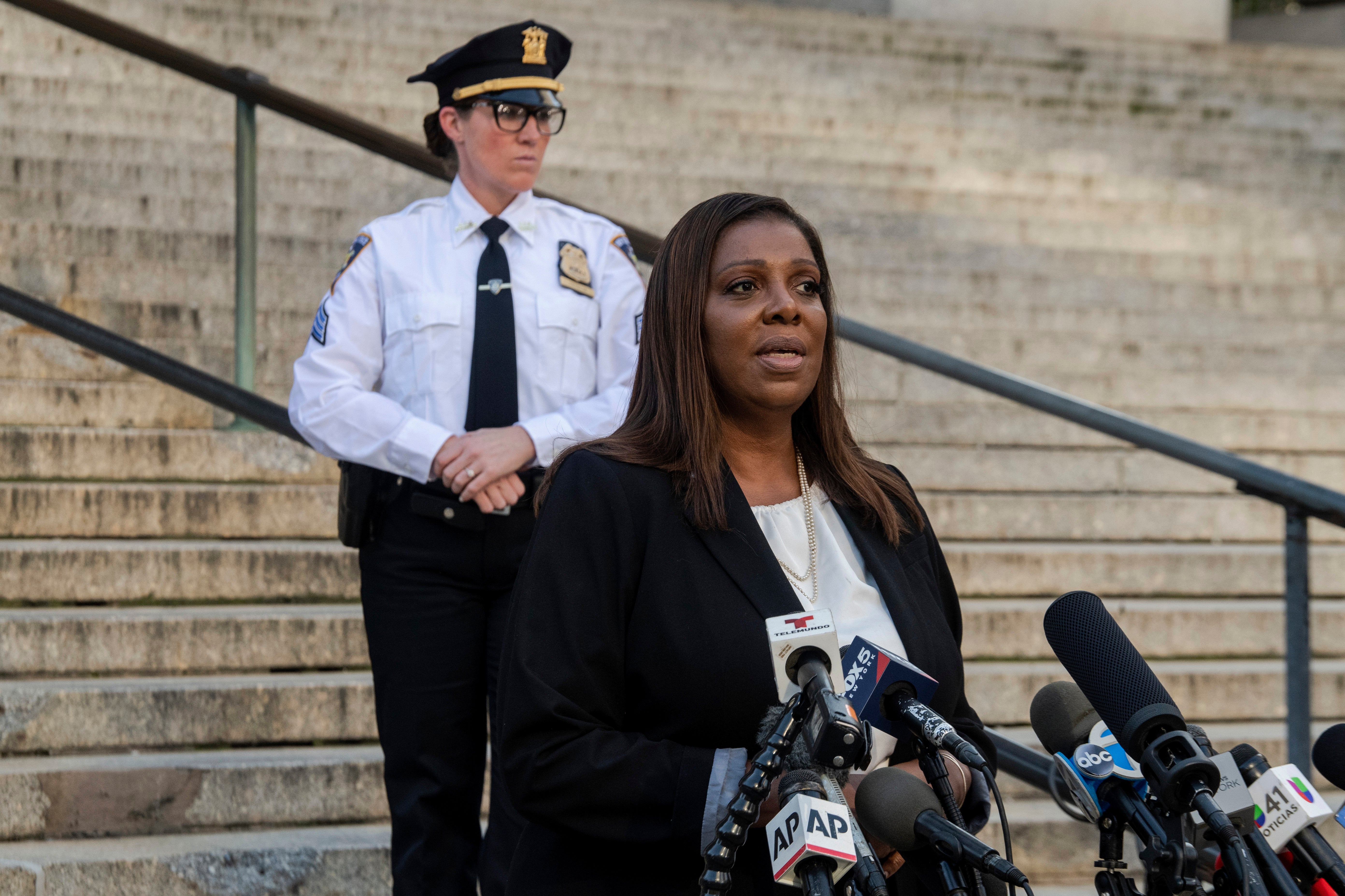 New York Attorney General Letitia James speaks outside New York Supreme Court ahead of former President Donald Trump's civil business fraud trial on Monday, Oct. 2, 2023
