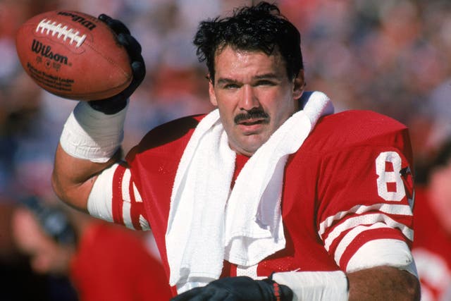 <p>Russ Francis of the San Francisco 49ers warms-up on the sideline during a game against the New Orleans Saints in 1987</p>