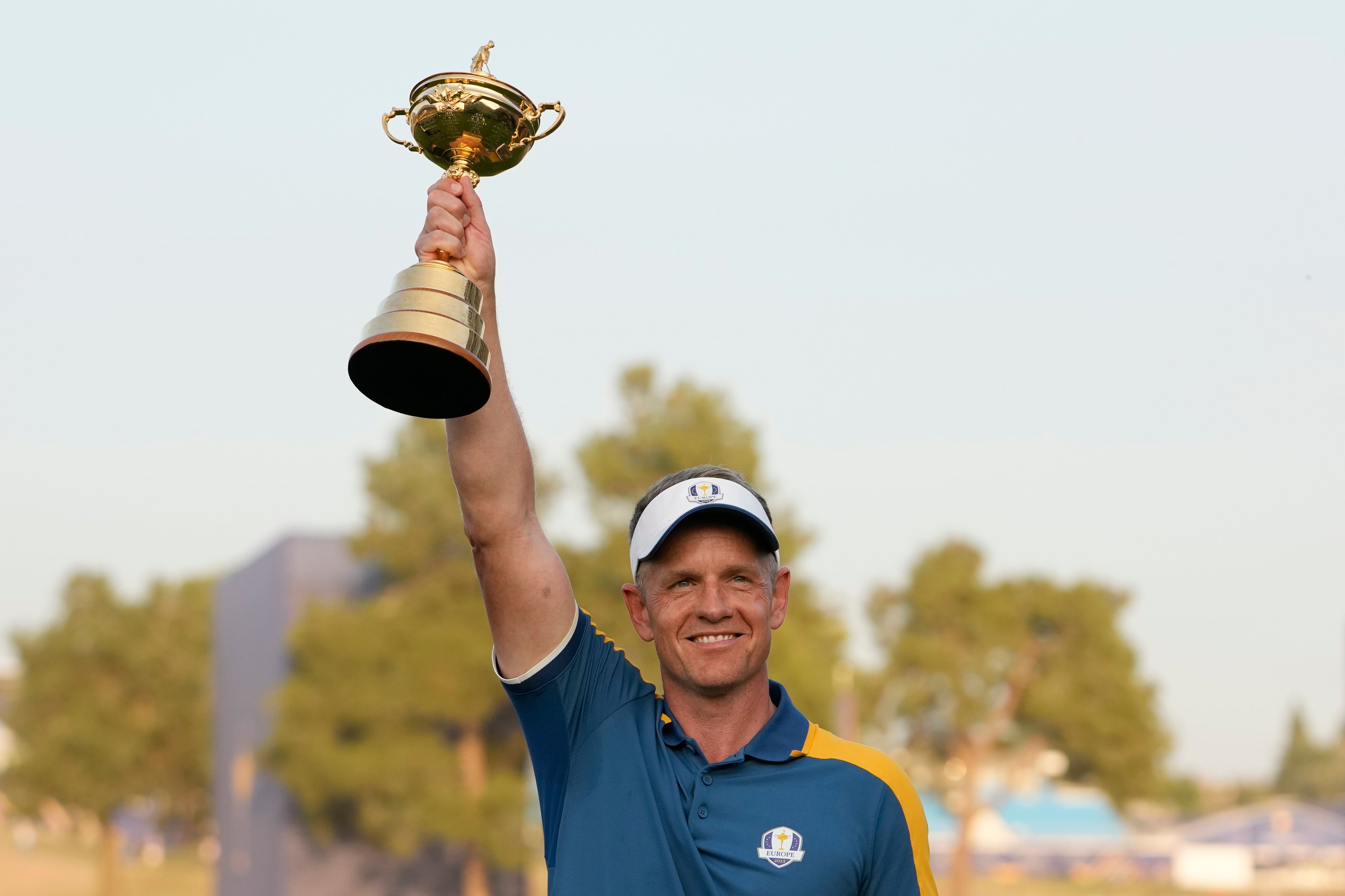 Luke Donald lifts the Ryder Cup. He hasn’t ruled out accepting a convention-breaking second captaincy