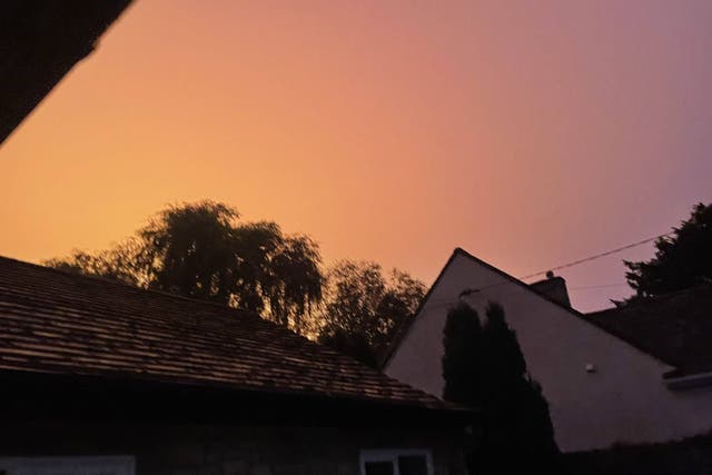 Videos on social media showed sky in in the area with an orange colour (@Stuartbigbro2/PA)