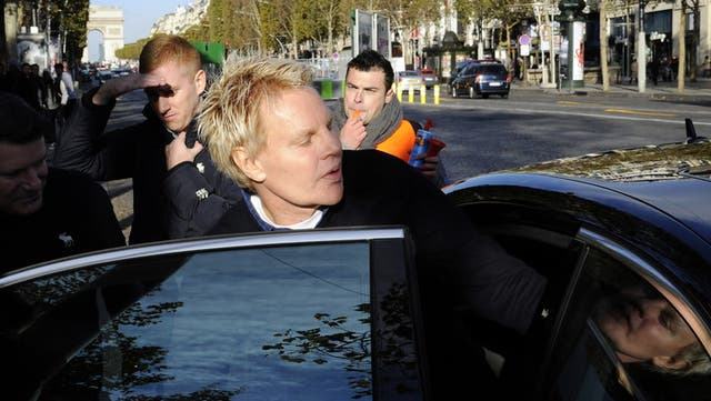 <p>File image: Mike Jeffries, then-CEO of US clothing retailer Abercrombie & Fitch, leaves the store on the Champs Elysees avenue in Paris on 27 October 2012</p>