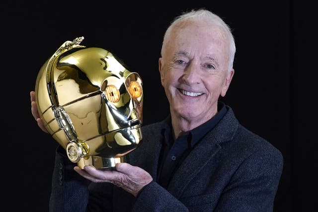 Anthony Daniels with a screen matched light-up C-3PO head from the 1977 film Star Wars: A New Hope which is part of his personal collection (Andrew Matthews/PA)