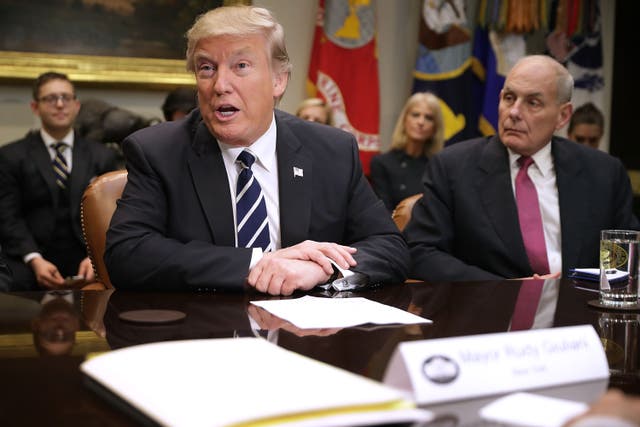 <p>U.S. President Donald Trump delivers remarks at the beginning of a meeting with Homeland Security Secretary John Kelly and other government cyber security experts in the Roosevelt Room at the White House January 31, 2017 in Washington, DC</p>
