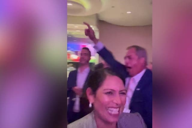<p>Priti Patel dances with Nigel Farage at Conservative Party conference.</p>
