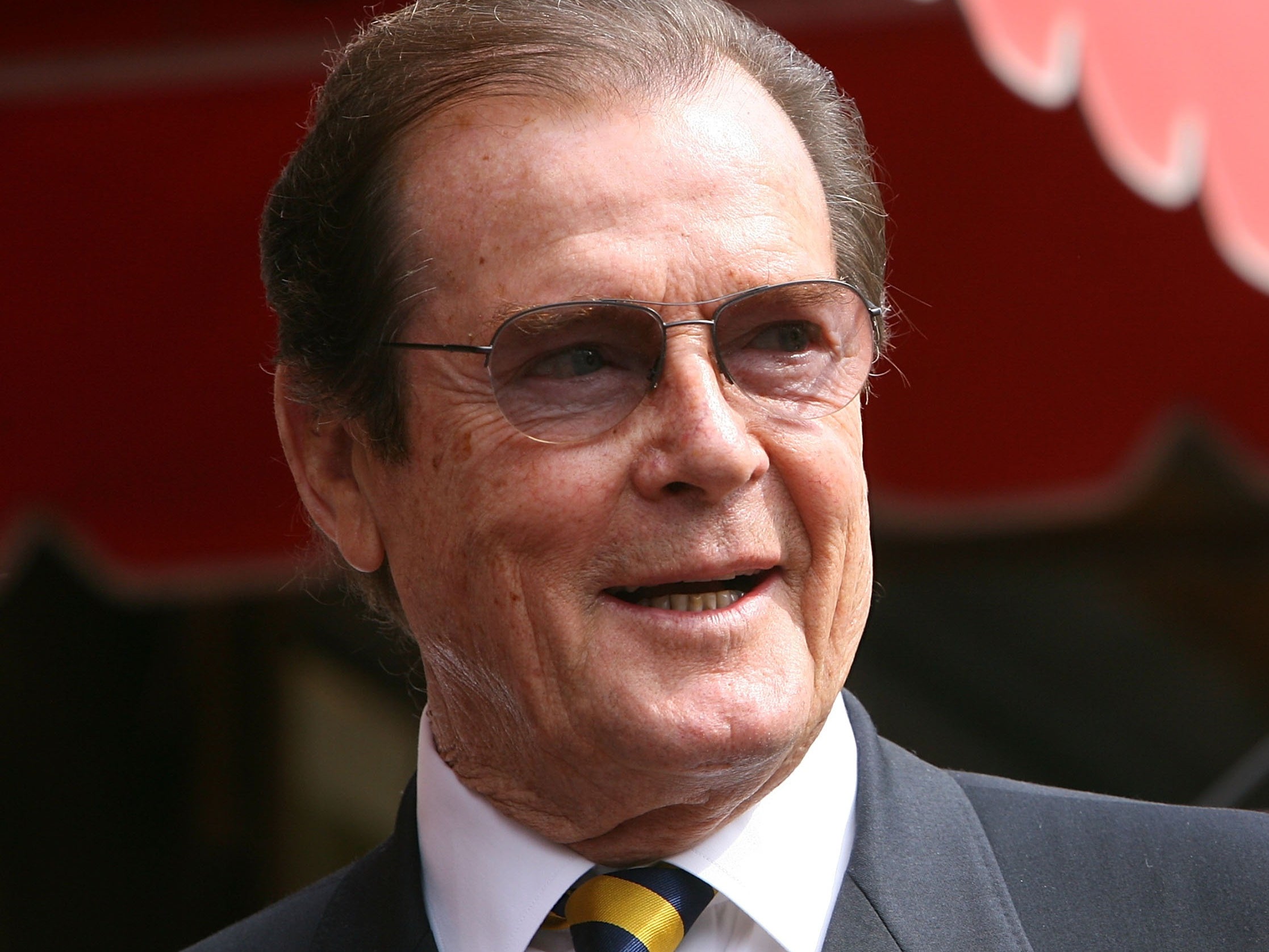 Roger Moore's Lookalike Sons Steal the Show as Bond Star's Estate ...