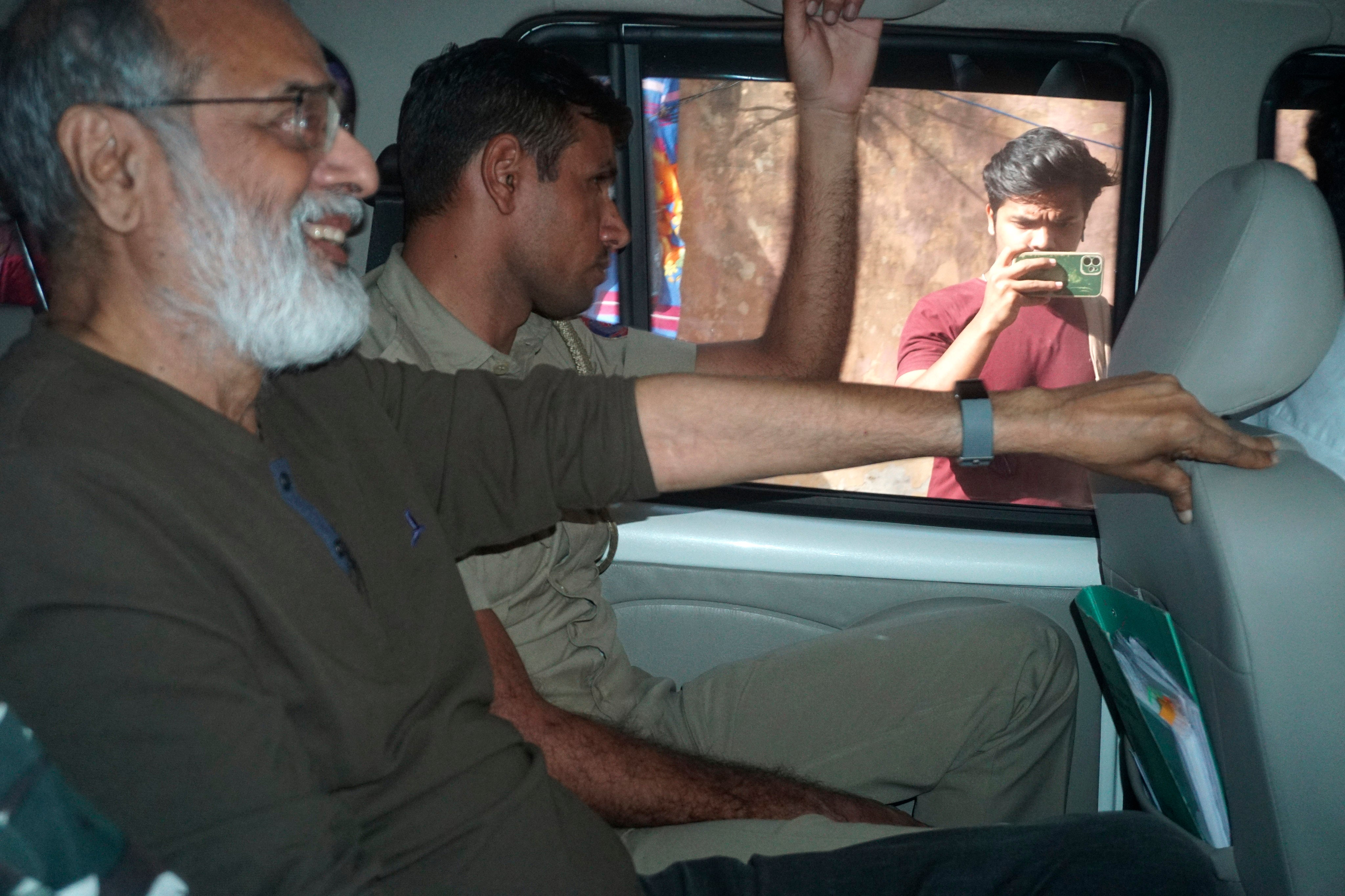 <p>Founder and Editor-in-Chief of NewsClick Prabir Purkayastha is seen here being taken into custody  on 3 October</p>