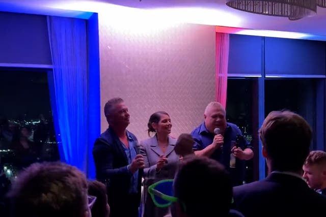 <p>Priti Patel belts out Robbie Williams on karaoke at Tory conference after party</p>