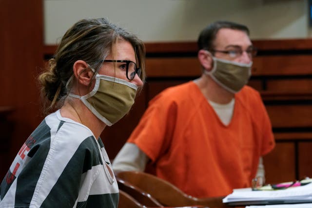 <p>In this Feb. 8, 2022, photo, Jennifer and James Crumbley, the parents of Ethan Crumbley, a teenager accused of killing four students in a shooting at Oxford High School, appear in court in Rochester Hills, Mich</p>