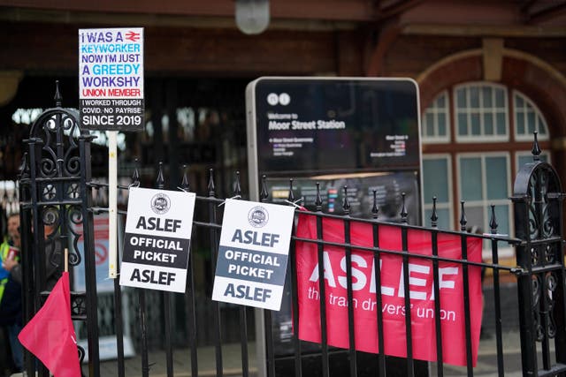 Members of the drivers’ union Aslef at 16 train operators in England will walk out (Jacob King/PA)