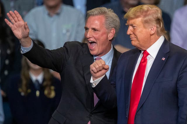 <p>House Minority Leader Kevin McCarthy and U.S. President Donald Trump attend a legislation signing rally with local farmers on February 19, 2020 in Bakersfield, California</p>