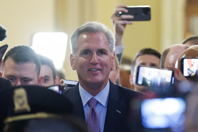 <p>U.S. House Speaker Kevin McCarthy (R-CA) walks back to his office from the House Chamber surrounded by reporters and cameras hours before a House vote</p>