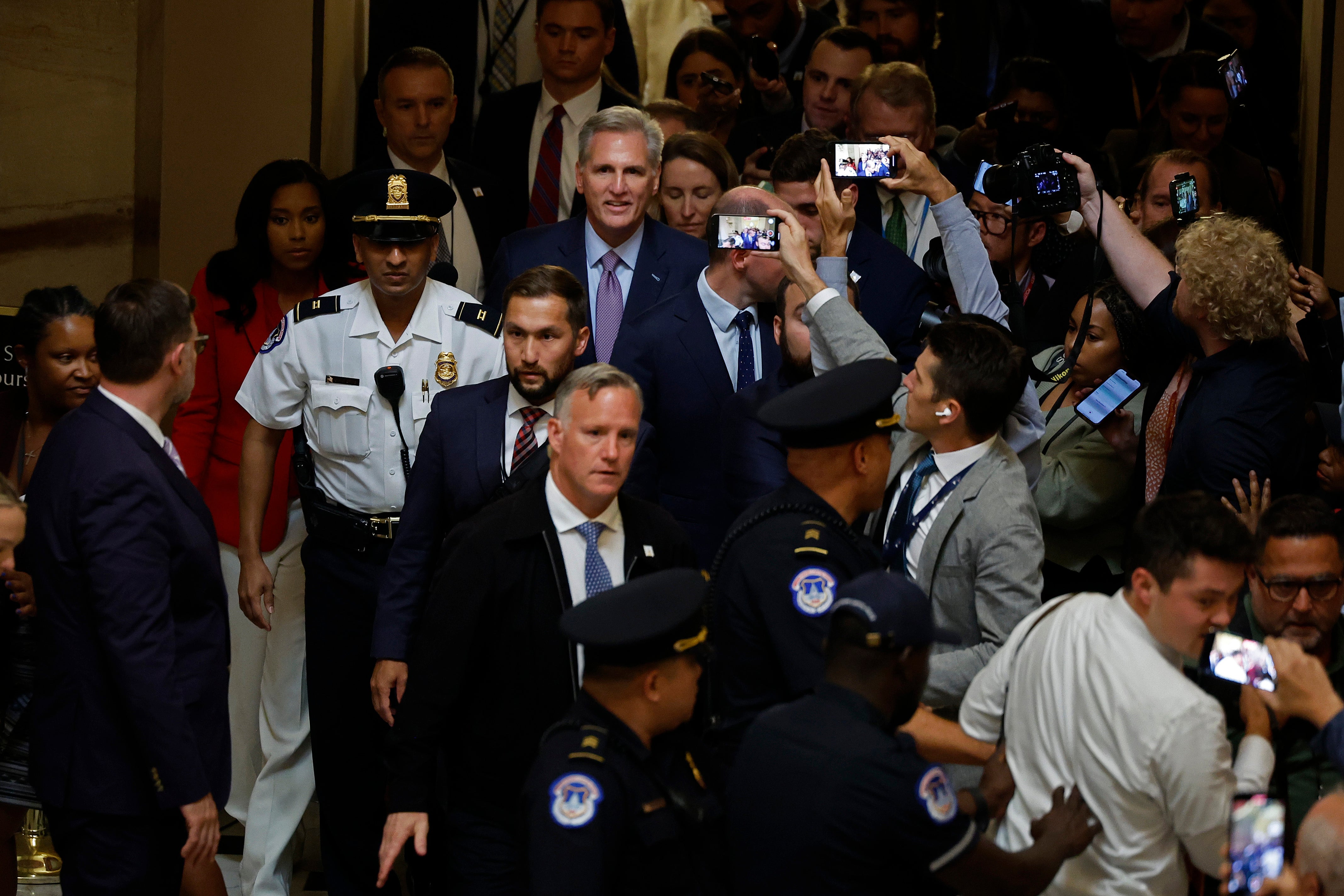 Kevin McCarthy walks through Statuary Hall after he was ousted as Speaker