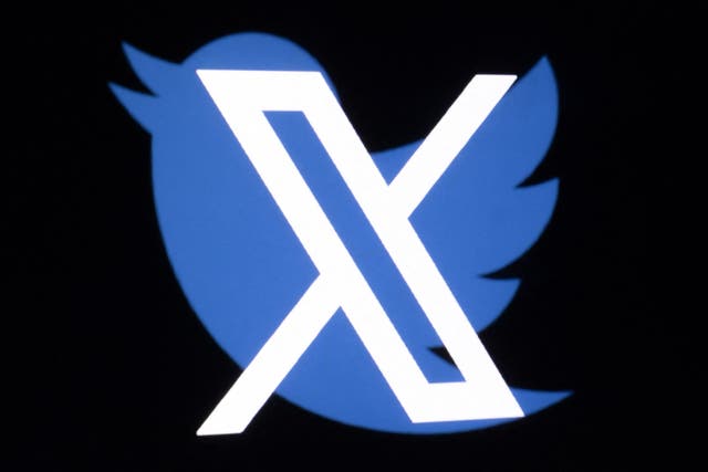 <p>This illustration photo shows the new Twitter logo rebranded as X, and the old Twitter bird logo reflected in smartphone screens, in Paris on 27 July 2023</p>