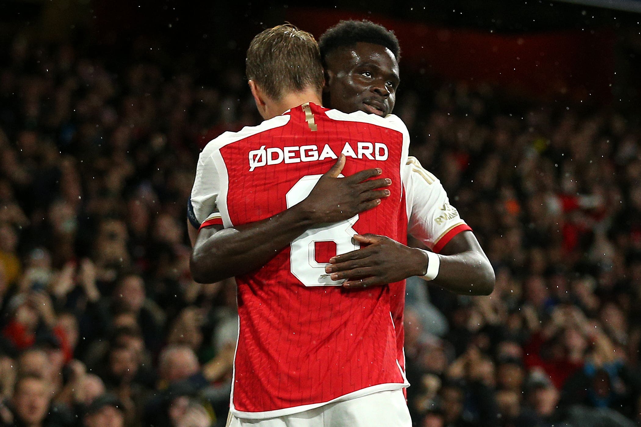 Martin Odegaard, left, thinks any team in world football would miss Bukayo Saka (Nigel French/PA)