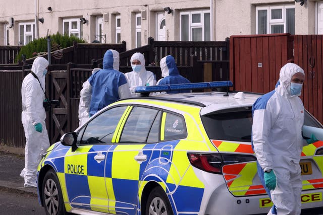 Forensic Officers on Maple Terrace in Shiney Row near Sunderland where a 54-year-old man was killed in a dog attack on Tuesday evening (Owen Humphreys/PA)