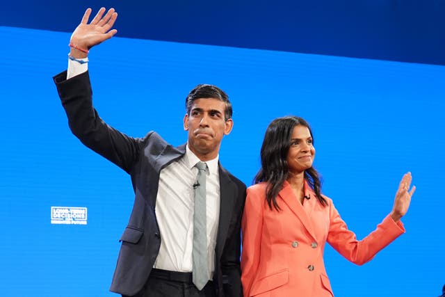 <p>Prime Minister Rishi Sunak and his wife Akshata Murty on stage after he delivered his keynote speech</p>