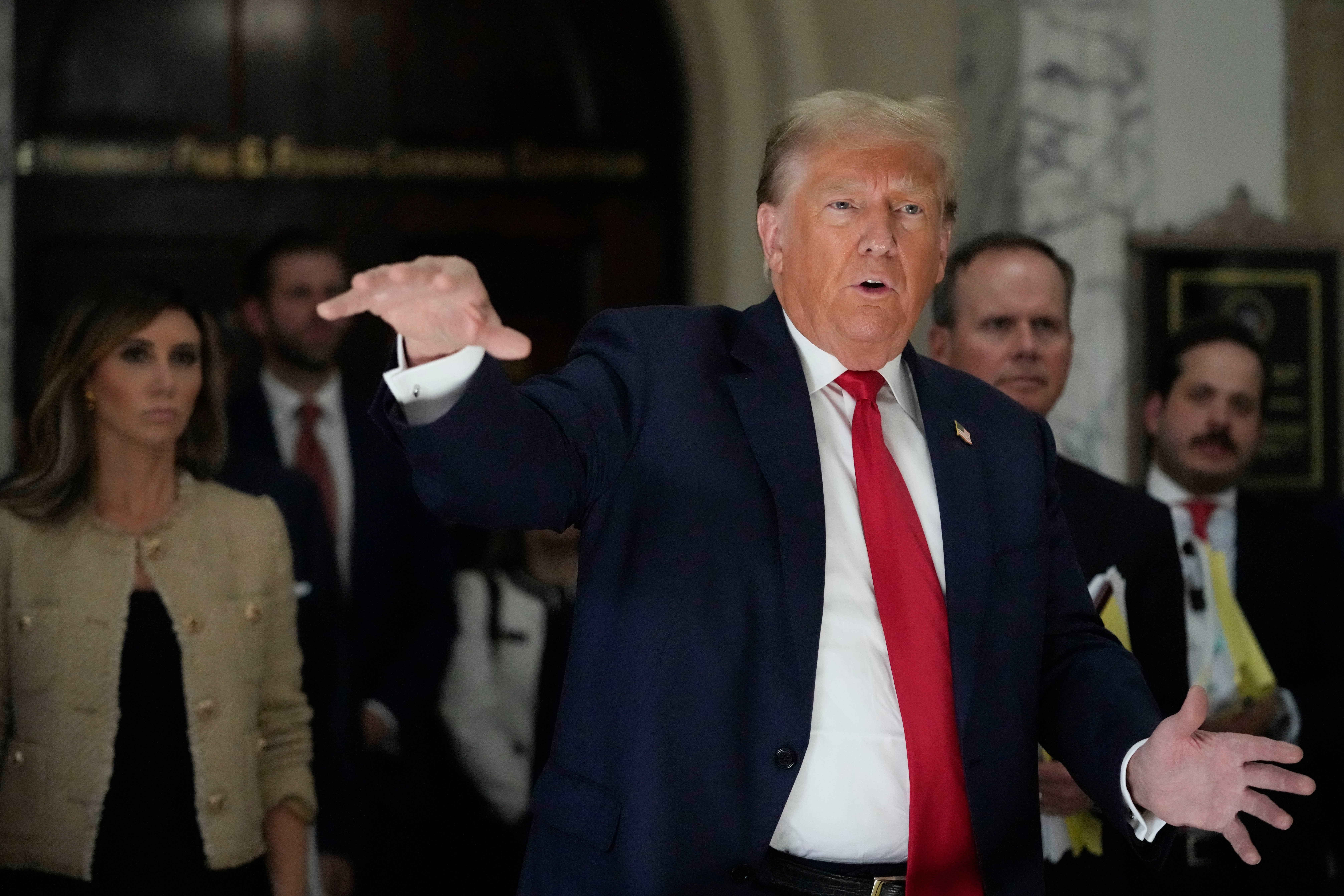 <p>Former President Donald Trump speaks to reporters as he leaves the courtroom during a lunch break in his civil business fraud trial, Wednesday, Oct. 4, 2023, in New York</p>