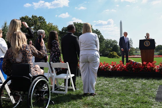Selma Blair (R), Actress and Disability Rights Advocate, introduces U.S. President Joe Biden during an event honoring the Americans with Disabilities Act (ADA) and Rehabilitation Act (Rehab Act) at the White House on 2 October 2023