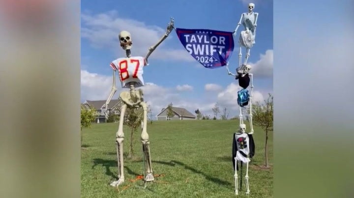 <p>12-foot Taylor Swift and Travis Kelce skeletons built for Halloween.</p>