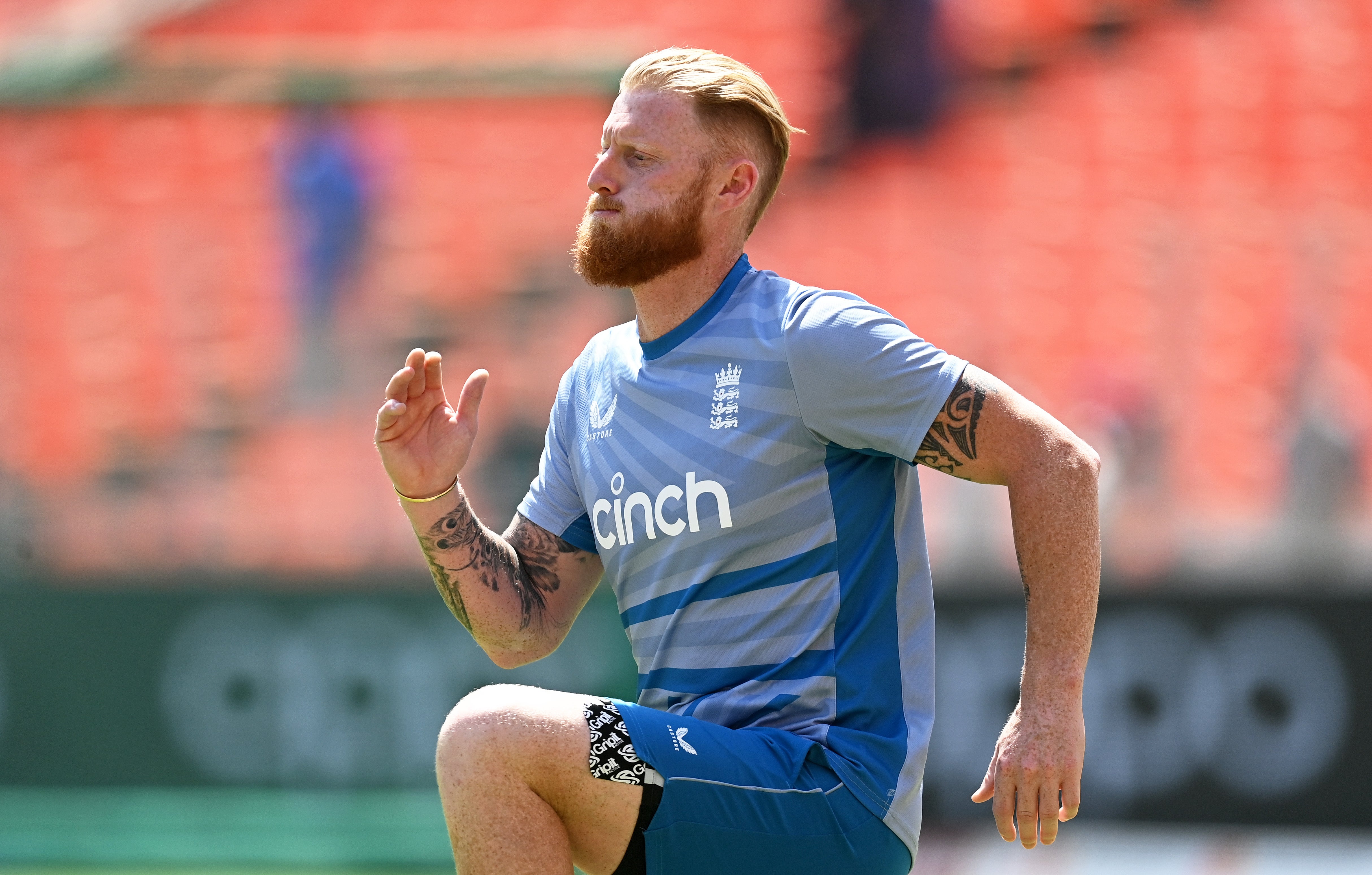 Ben Stokes warms up on the pitch