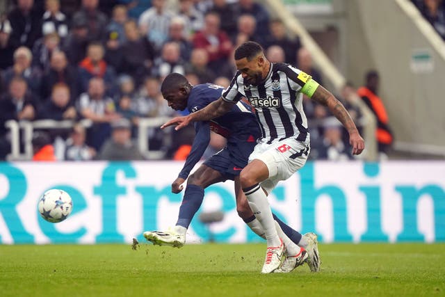 Jamaal Lascelles (right) led Newcastle to a stunning Champions League victory over Paris St Germain (Owen Humphreys/PA)