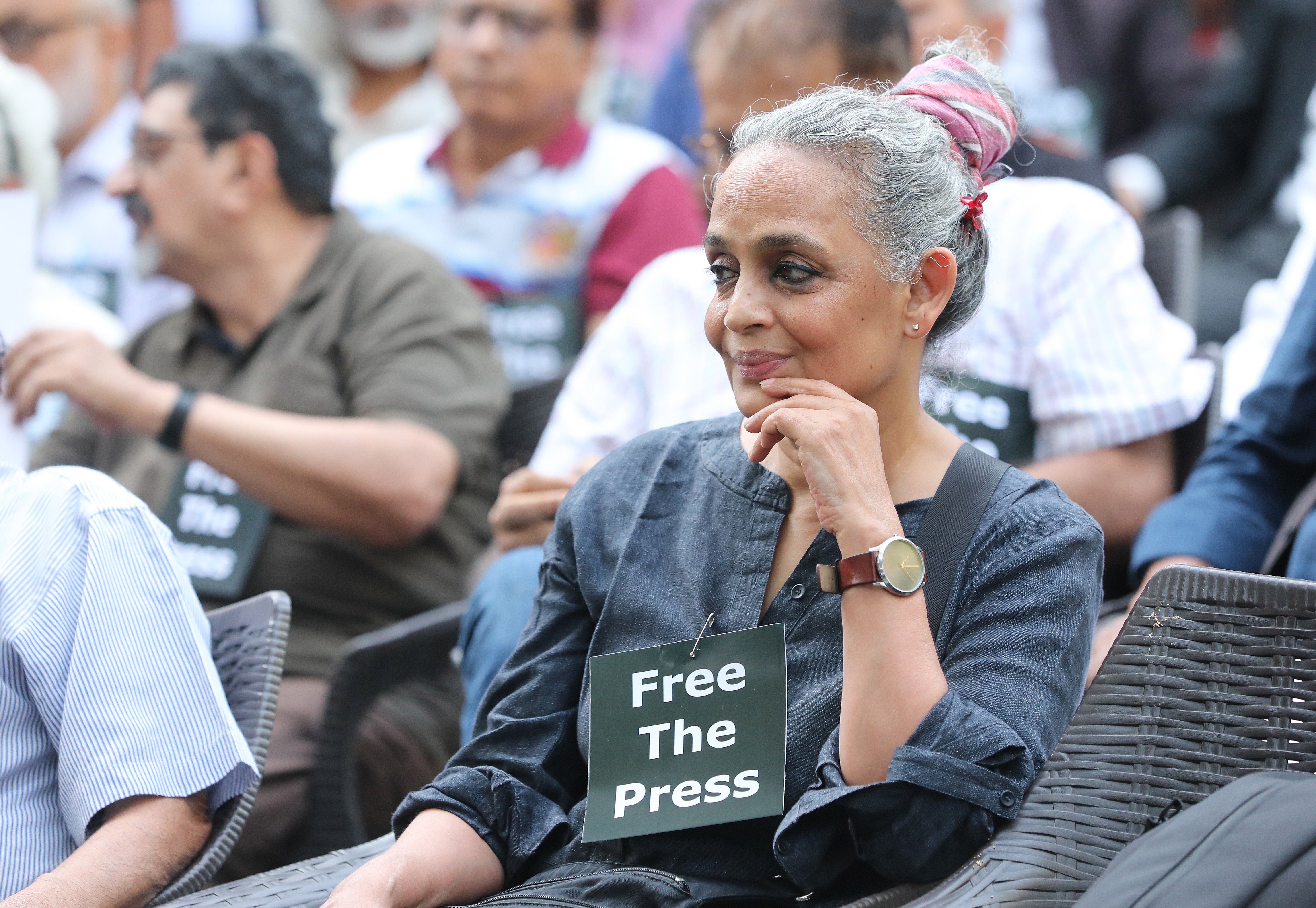 Booker Prize winner Arundhati Roy attends a protest at a press club in New Delhi on Wednesday (4 October)