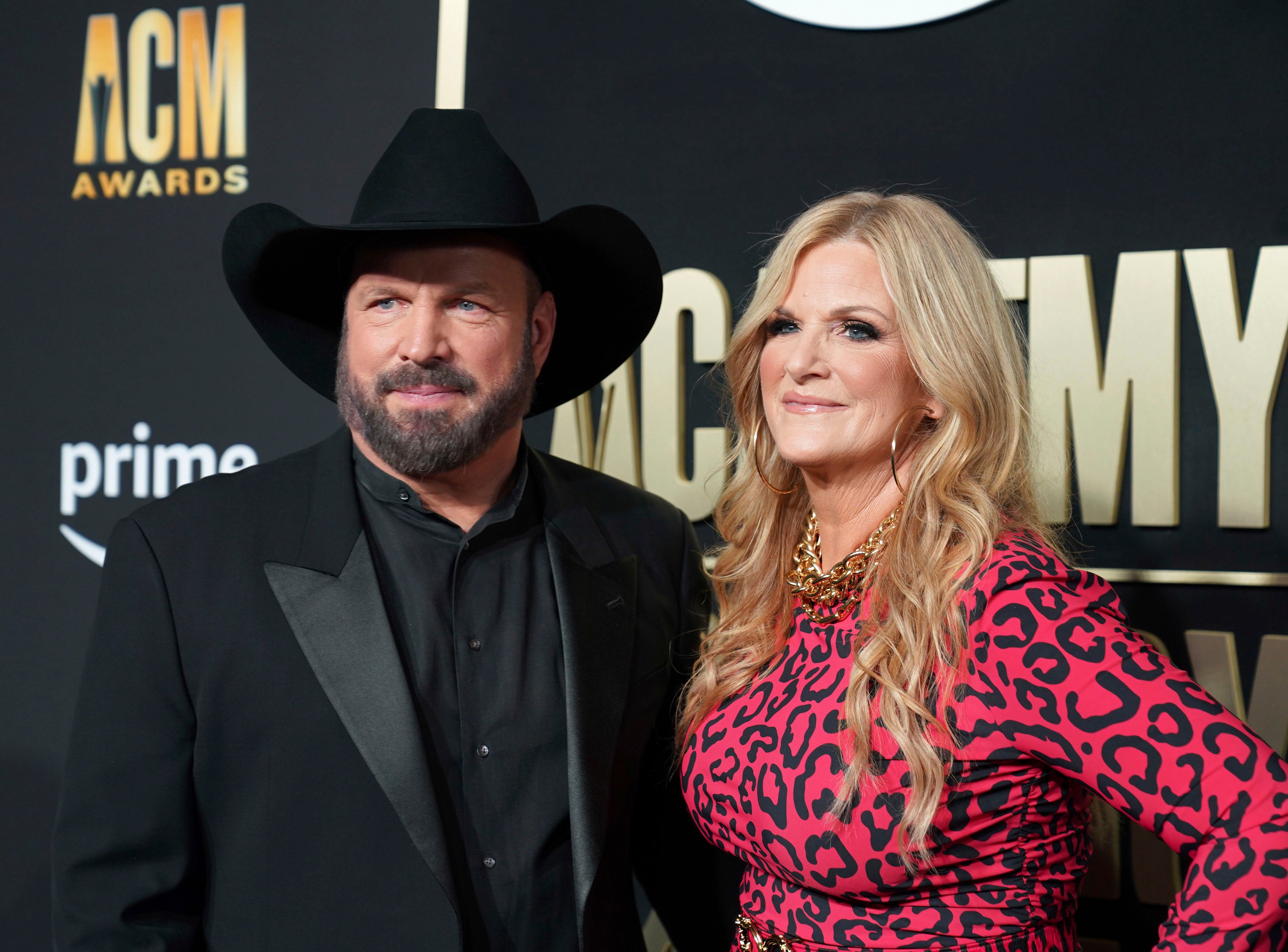 Brooks, left, with his wife, Trisha Yearwood