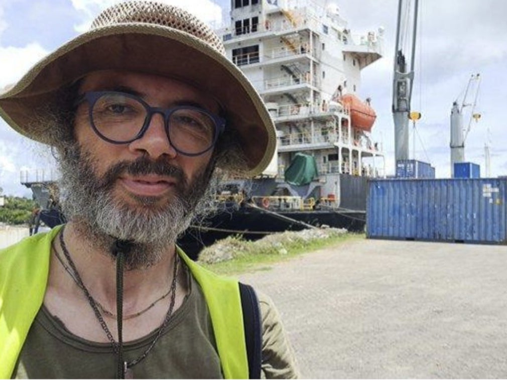Dr Gianluca Grimalda pictured on his 9,300-mile overland journey to Papua New Guinea. The senior climate researcher at the Kiel Institute in Germany, lost his job this week over his refusal to fly