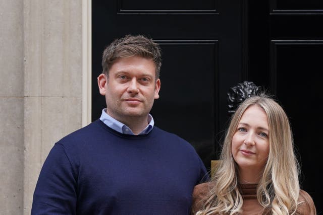 Ceri (left) and Frances Menai-Davis hands in a petition to 10 Downing Street, London, in support of Hugh’s Law, which calls for financial assistance for the parents of long-term sick children, in memory of their six-year-old son, Hugh, who died of a rare form of cancer in 2021 (Lucy North/PA)