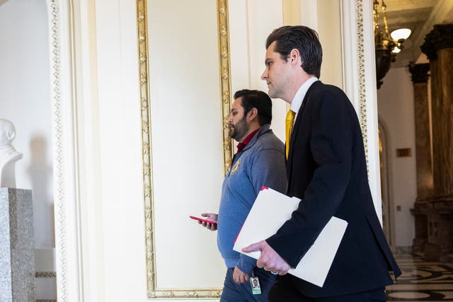 <p>Rep. Matt Gaetz (R-FL) and a member of his staff walk through the U.S. Capitol Building on October 02, 2023 in Washington, DC</p>