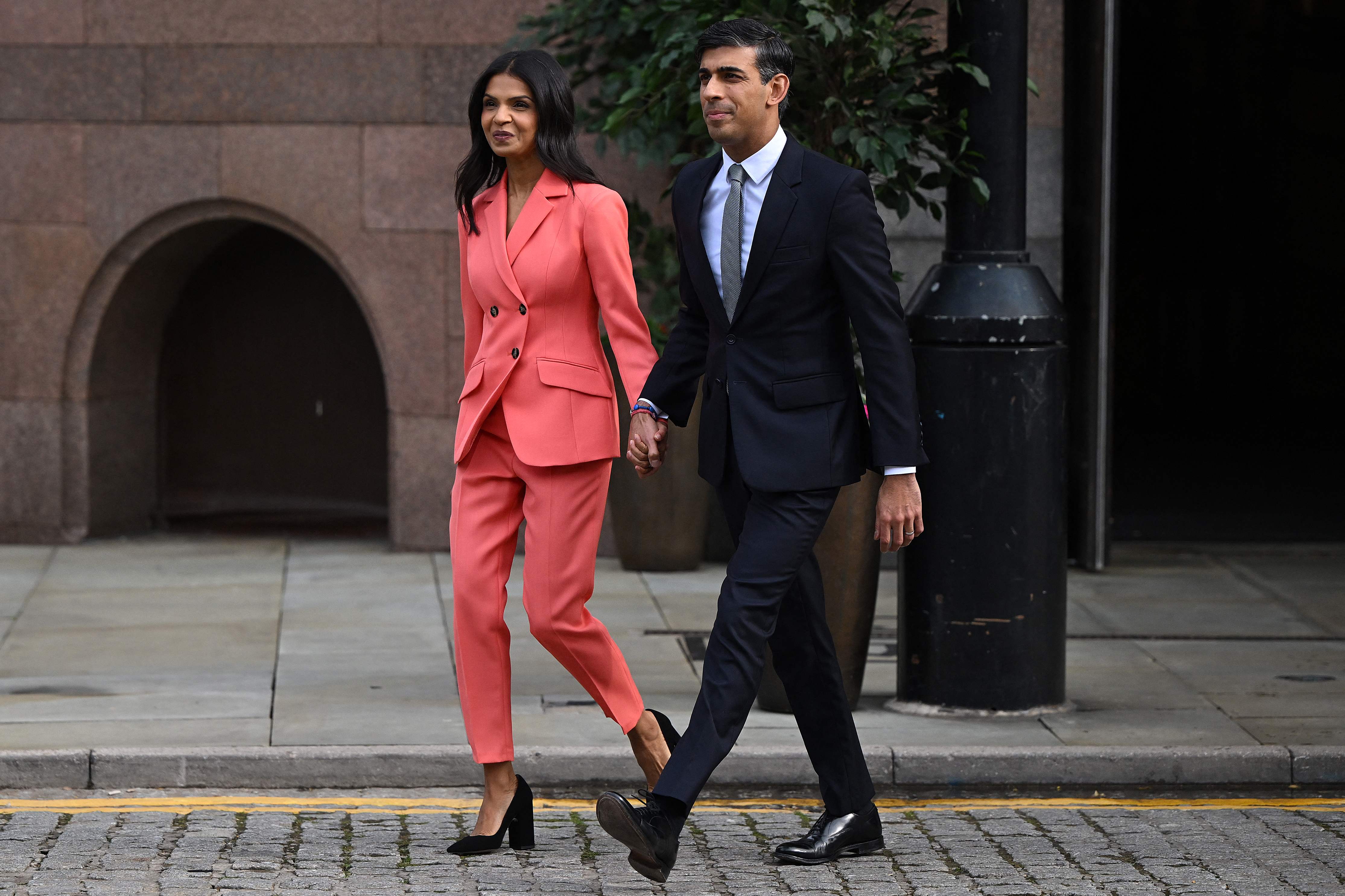 On the cobbles: Rishi Sunak and Akshata Murty walk to the Tory conference hall in Manchester for his keynote speech