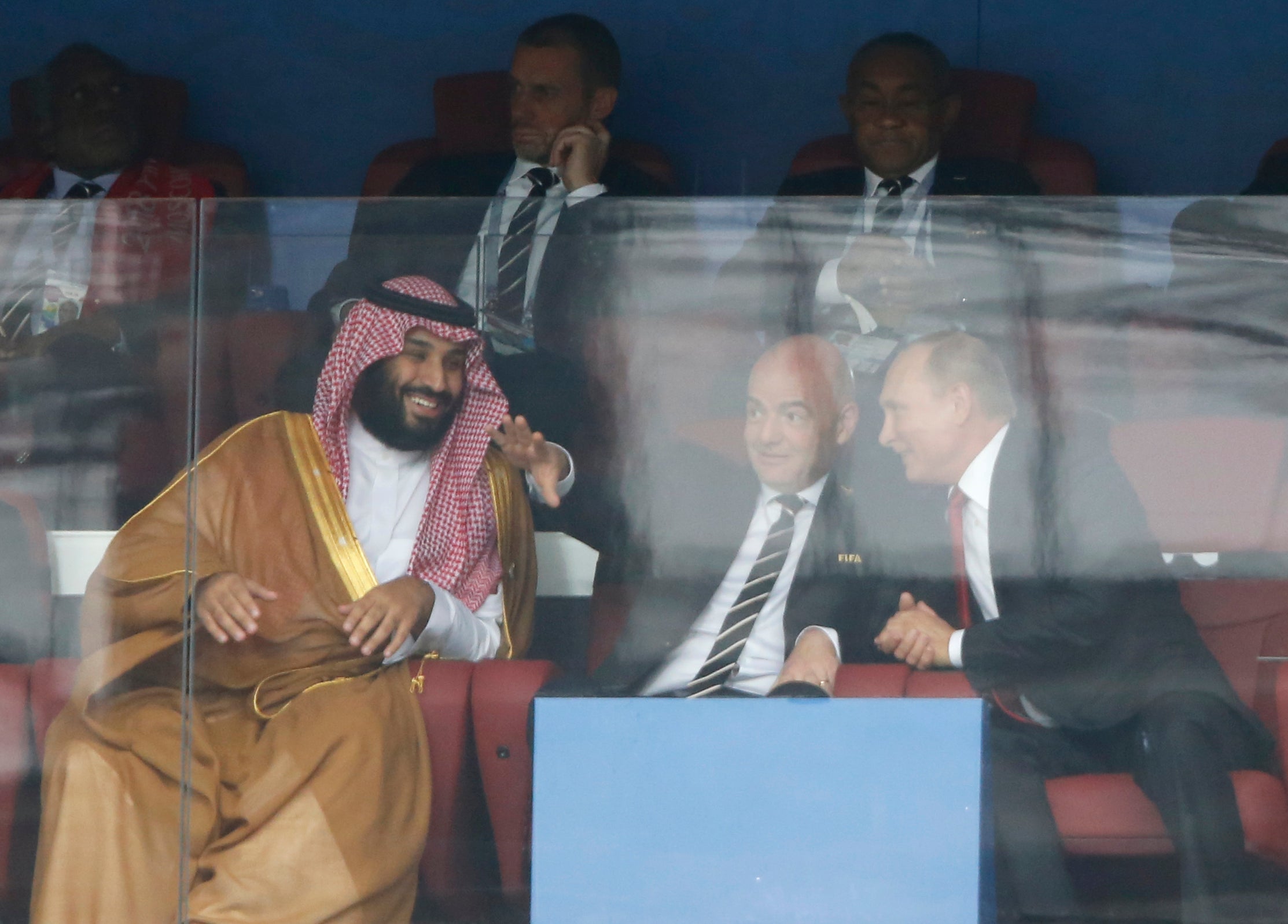 Saudi Arabia crown prince Mohammed bin Salman, Fifa president Gianni Infantino and Russian president Vladimir Putin at the World Cup in Moscow in 2018