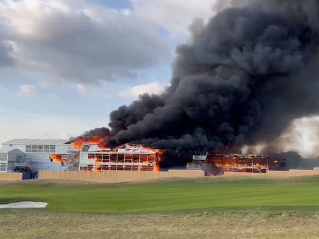 <p> A hospitality structure caught fire beside the 18th hole </p>