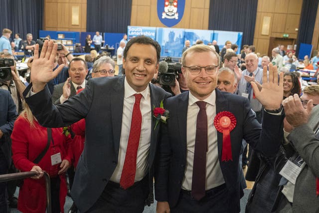 Scottish Labour leader Anas Sarwar celebrates with Michael Shanks after the party won the Rutherglen and Hamilton West byelection. (Jane Barlow/PA)