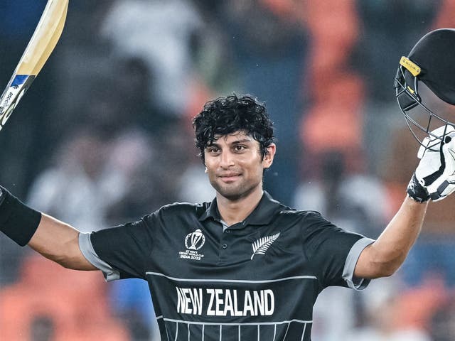 <p>New Zealand’s Rachin Ravindra celebrates after scoring a century (100 runs) during the 2023 ICC men’s cricket World Cup one-day international (ODI) match between England and New Zealand at the Narendra Modi Stadium in Ahmedabad on 5 October</p>