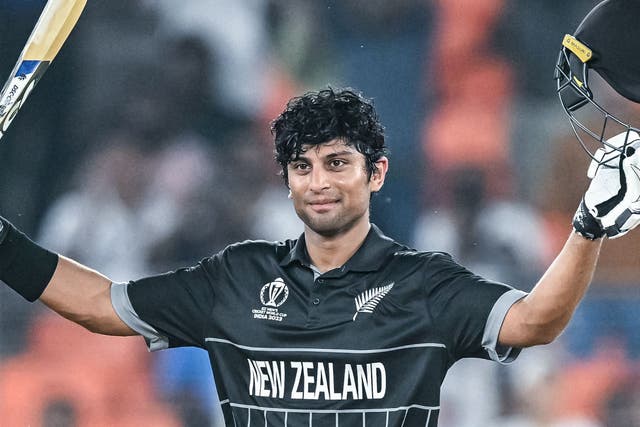 <p>New Zealand’s Rachin Ravindra celebrates after scoring a century (100 runs) during the 2023 ICC men’s cricket World Cup one-day international (ODI) match between England and New Zealand at the Narendra Modi Stadium in Ahmedabad on 5 October</p>