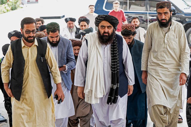 <p>Taliban’s minister of foreign affairs, Amir Khan Muttaqi (centre) arrives at a press conference in Kabul</p>