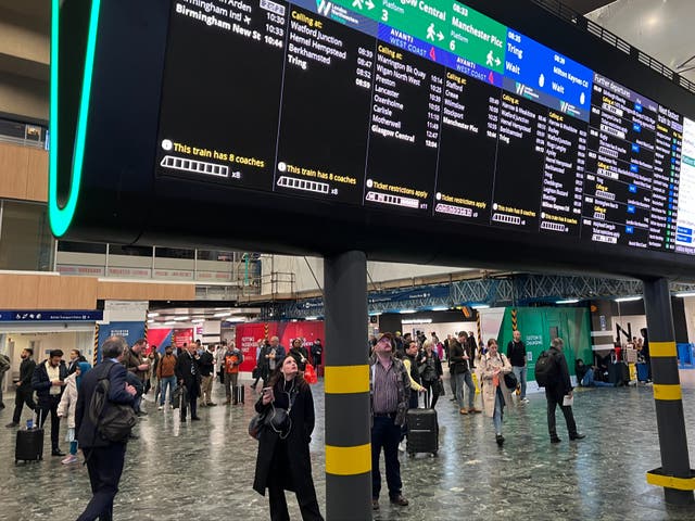 <p>Departing soon? Travellers on the concourse at London Euston station, main arrival point for rail passengers from Birmingham</p>