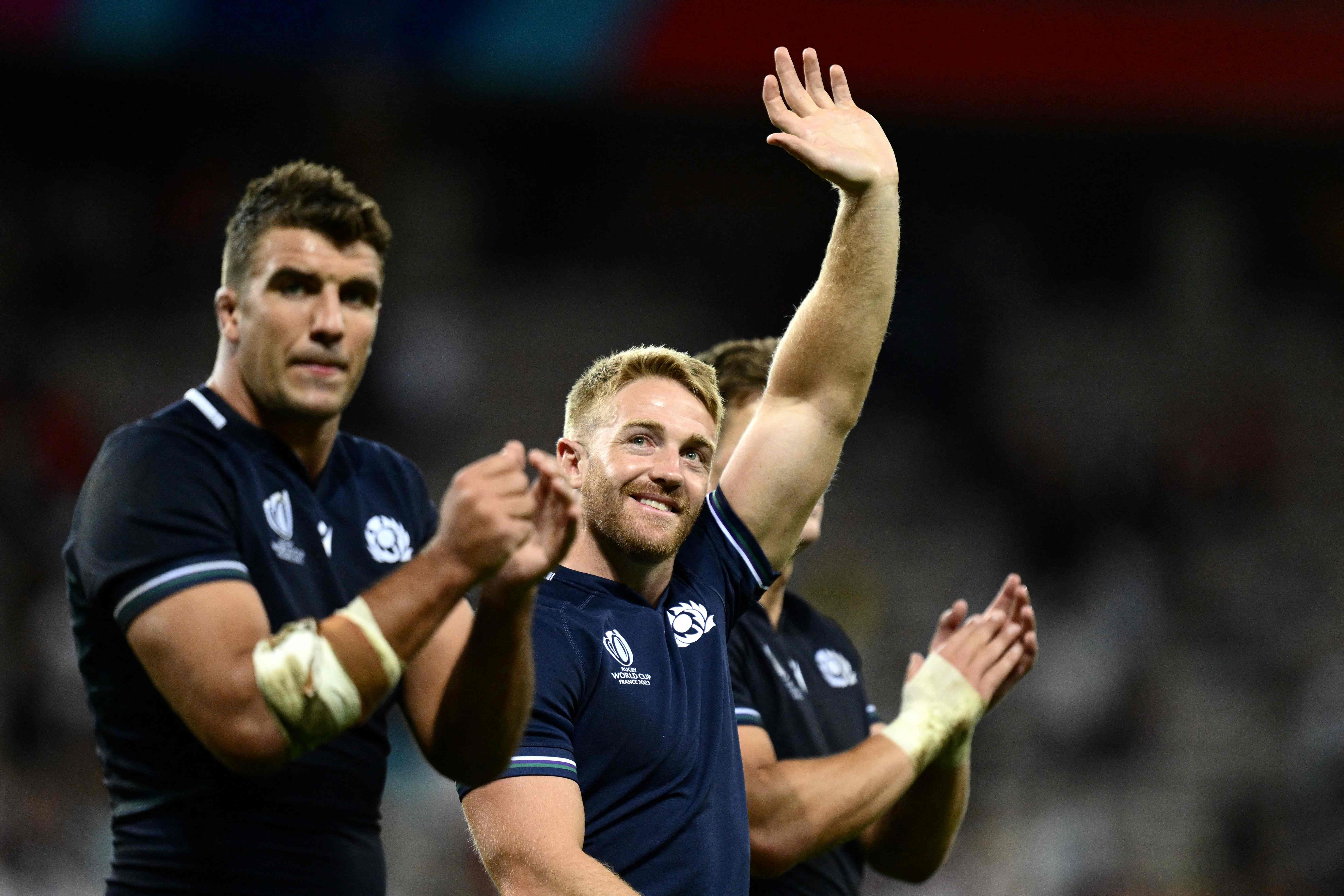 Scotland’s wing Kyle Steyn and lock Sam Skinner celebrate beating Tonga