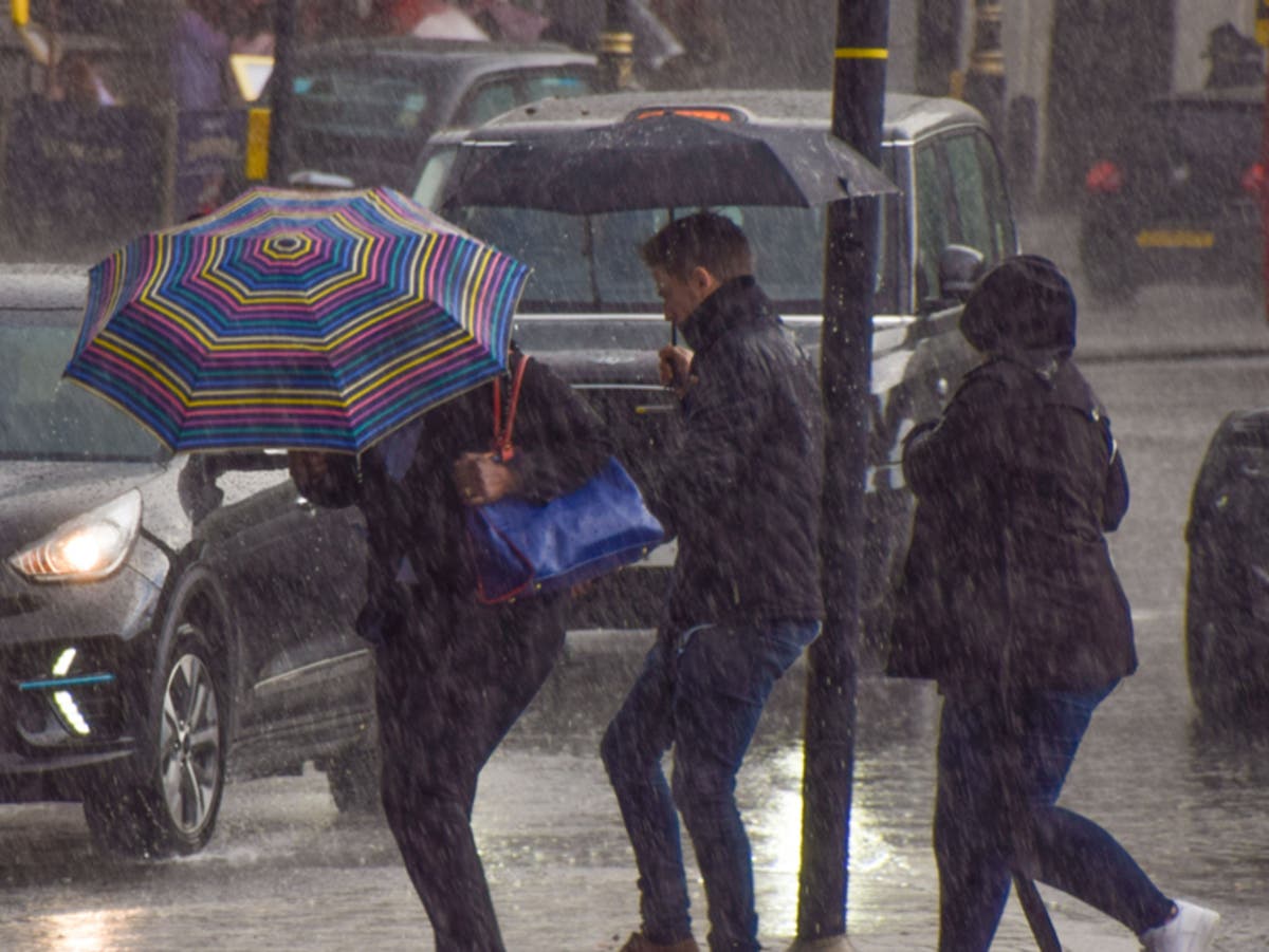 Met Office &lsquo;danger to life&rsquo; warning as weekend sees UK split between warm weather and heavy rain