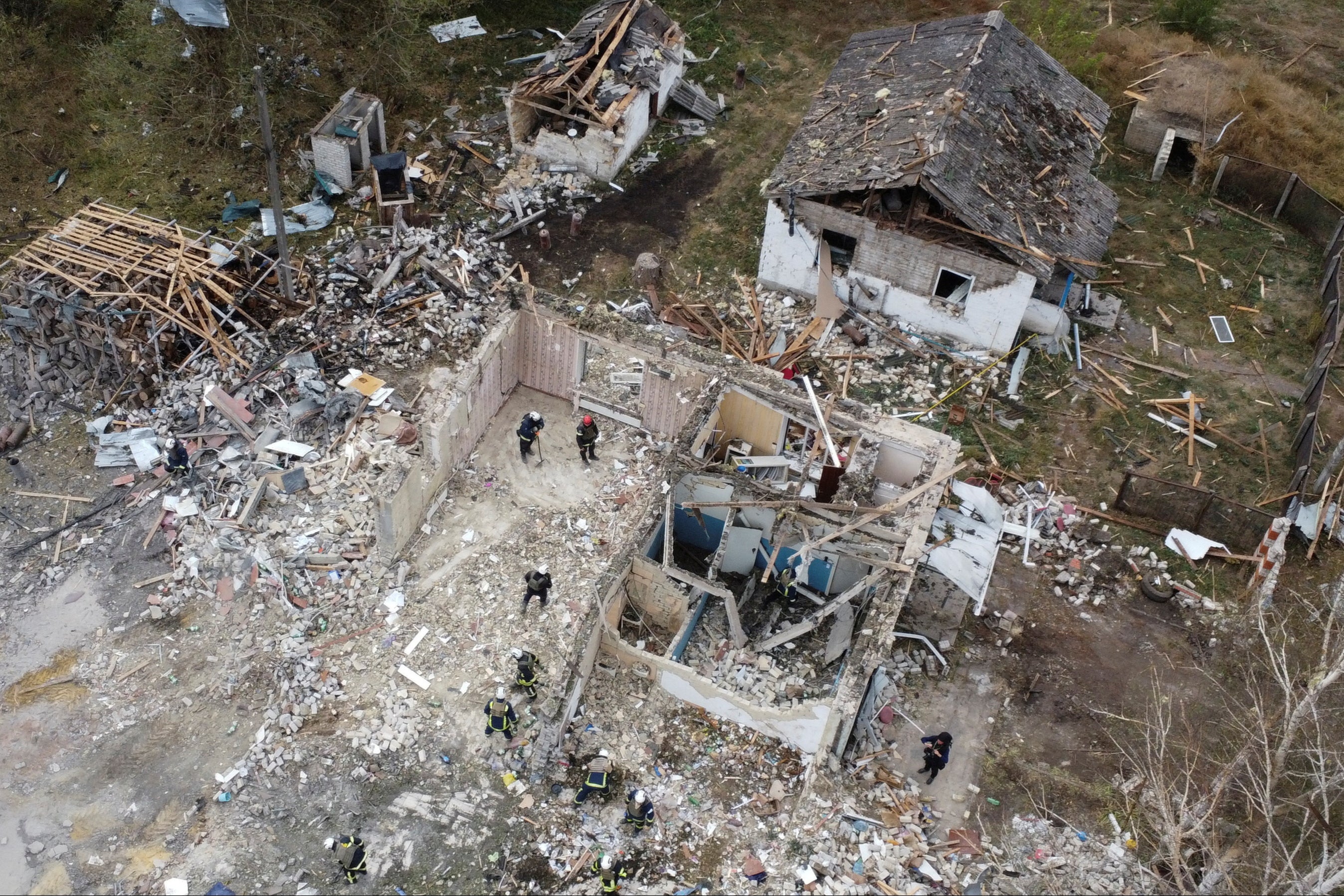 The remains of a cafe and grocery store in Hroza hit by the Russian missile